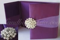 Make your big wedding day a luxury one by starting the invitation with NANGFA's world famous silk invitation boxes featuring crystal embellishments with czech rhinestones and fine silk lining. Each box can be ordered individually in your custom color and 