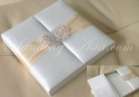 Make your big wedding day a luxury one by starting the invitation with NANGFA's world famous silk invitation boxes featuring crystal embellishments with czech rhinestones and fine silk lining. Each box can be ordered individually in your custom color and 