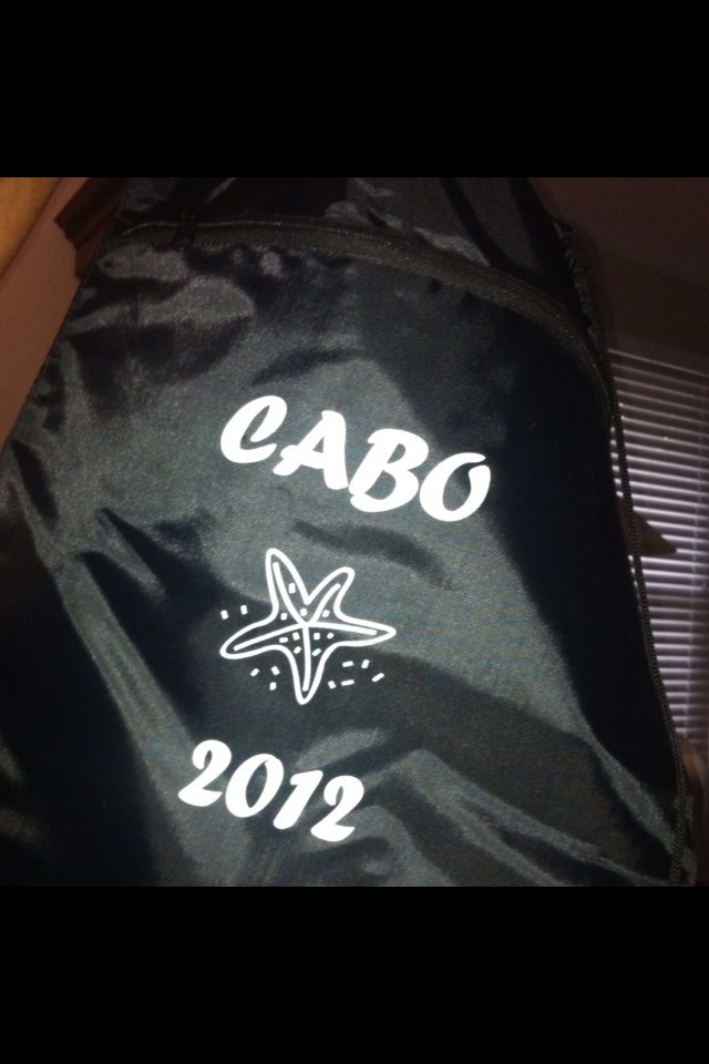 5 Drawstring backpacks ..Cabo 2012 , black w/ white imprint