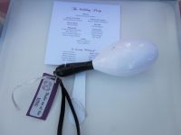 Our ceremony programs and light up maracas that were on each seat at the ceremony.