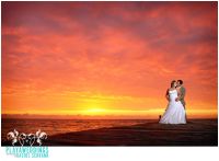 Sunrise trash the dress.  Photography by Rachel Schrank of Playaweddings.