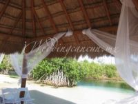 ceremony decor next to the mangrove and river at hacienda tres rios