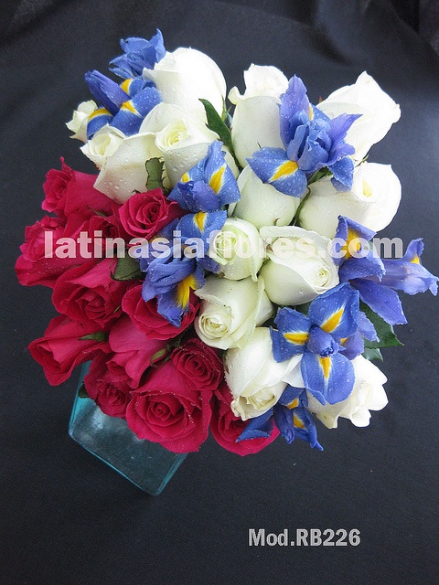 blue iris  with white and fyusha roses