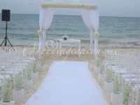 white ceremony decor at banyan tree mayakoba