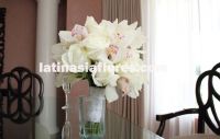 White bouquet. combination of roses and cymbidium orchids 