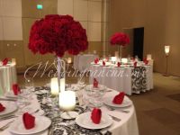red roses tall centerpiece