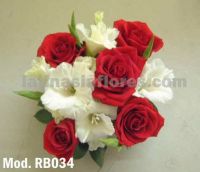 white gladiolus and red roses bridal bouquet
