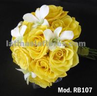 yellow roses and white dendrobium orchids bridal bouquet