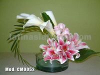 pink oriental lilies and roses with mexican calla lilies wedding centerpiece