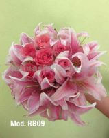 pink oriental lilies and fiucsa roses bouquet