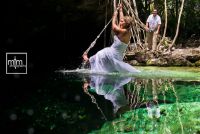 *
Bride swinging on cenote rope