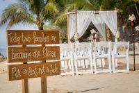 White ceremony setup in a private beach "Las Caletas"