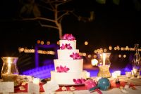 spectacular wedding cake with pink orchids