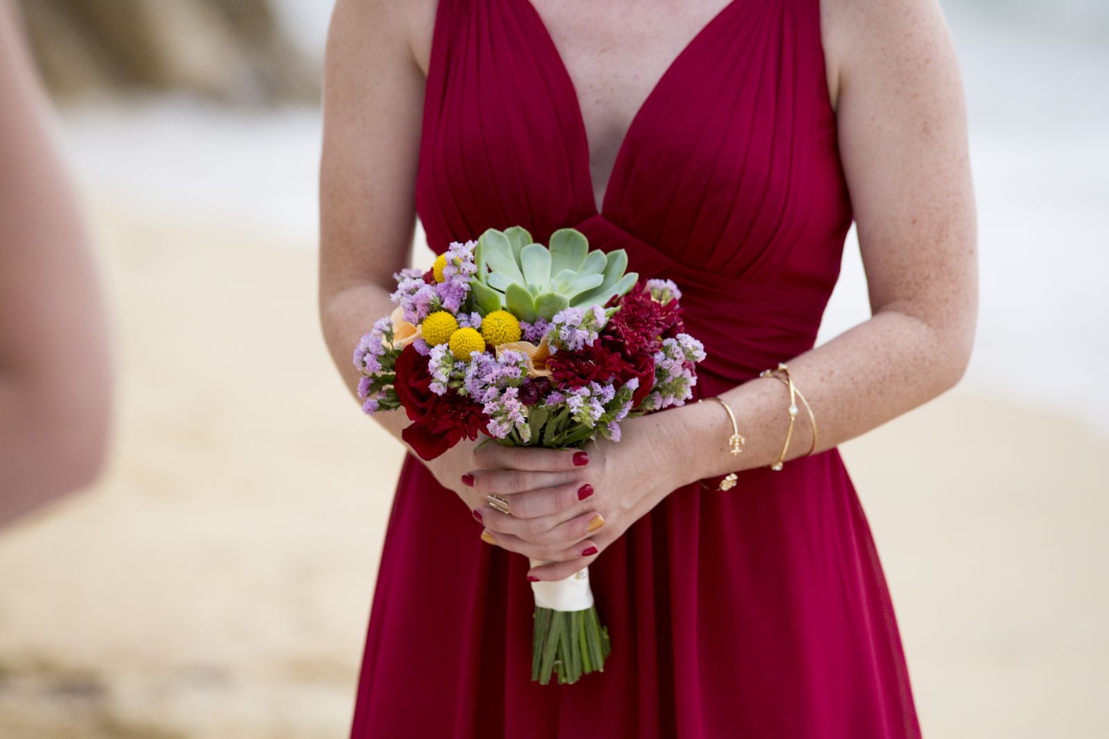 bridesmaid in red and beautiful bouquet