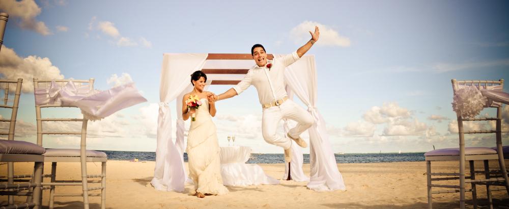 Joyful newlyweds after their wedding ceremony at Paradisus Palma Real