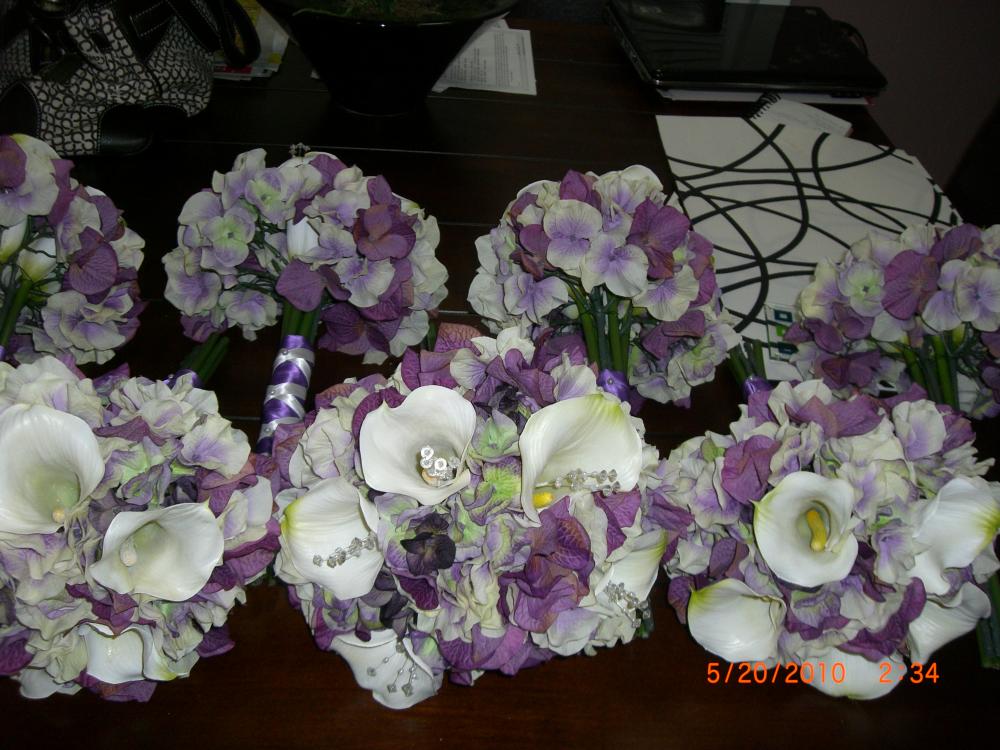 Selling my silk wedding flowers! 1 bridal, 1 maid of honor and 4 bridesmaids..calla lillies & hydranias white & purples
