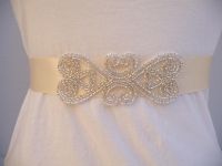 Handmade Silver Beaded Bridal Sash made with Double faced Ivory Satin Ribbon.  Buy at www.BellaCescaBoutique.Etsy.com