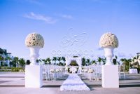 White wood gazebo with white fabrics