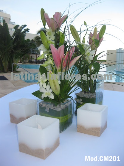 pink lilies and white dendrobium orchids wedding centerpiece