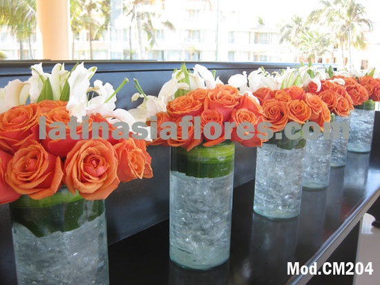 orange roses and white oriental lilies centerpiece