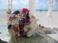 fyusha, purple & white bridal bouquet. Combination of roses, lisianthus and cymbidium orchids