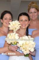 bridesmaid bouquet. combination of calla lilies and ivory roses