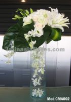 white oriental lilies and ivory roses with white dendrobium orchids wedding Centerpiece