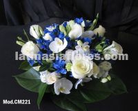 white phaleanopsis orchid with ivory roses and blue alstroemeria wedding centerpiece