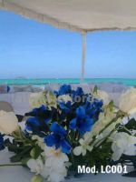 blue alstroemeria and white orchids wedding centerpiece