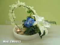 blue roses with white drndrobium orchid and white oriental lily wedding centerpiece