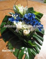 blue alstroemeria and white roses with casablanca lilies wedding centerpiece