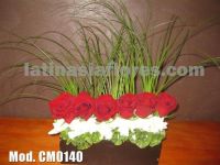 red roses and white carnations centerpiece