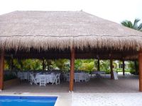 Tucanes Bar being set up for a reception.
This spot was lovely. You could have lights set up along the pool and it's covered, so no matter what the weather you would be good. Bathroom just across a walkway.
I would think this area would work for about 3