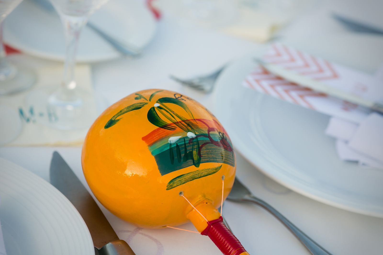 We bought the wooden maracas on 5th Ave. in Playa, and used them as our wedding favors - we put one out at each place setting.