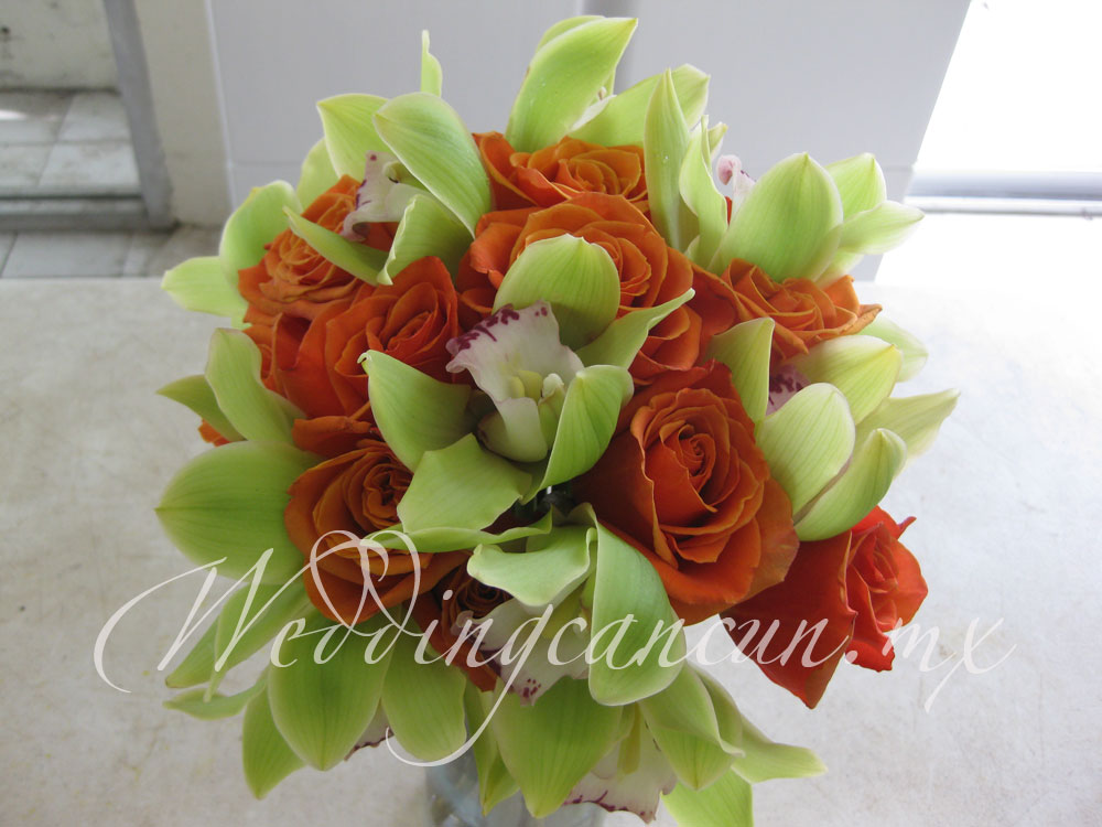 orange and green bouquet. Combination of roses and cymbidium orchids.