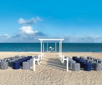 www.crystalwaterweddings.com Experienced travel agents who strongly value providing first class service and have a deep passion for destination weddings.  Nautical.  Crisp navy blue and white fabrics of varying pattern, while an aisle of brilliant white p