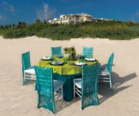 
www.crystalwaterweddings.com Experienced travel agents who strongly value providing first class service and have a deep passion for destination weddings.  Exotic Peacock.  Chair backs adorned with squares of brilliant turquoise and crisp white merge per