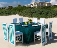 
www.crystalwaterweddings.com Experienced travel agents who strongly value providing first class service and have a deep passion for destination weddings.  Exotic Peacock.  Chair backs adorned with squares of brilliant turquoise and crisp white merge per