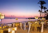  www.crystalwaterweddings.com Experienced travel agents who strongly value providing first class service and have a deep passion for destination weddings.   Dreams Palm Beach Punta Cana.  A dinner set-up on the sandy-white beach at Dreams Palm Beach durin