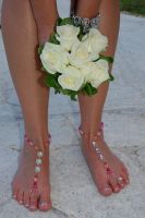 Bridesmaid with barefoot jewelry on from Red-i by Chelsea