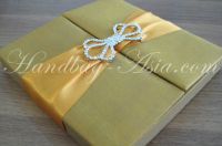 Luxury gold color silk invitation box with embellishment by NANGFA