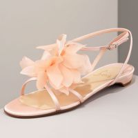 Christian Louboutin Petal Sandal - also comes in flats perfect for the beach!