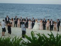 wedding party on the Beach of the Now Sapphire Resort
