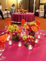 colorful centerpiece with roses and orchids