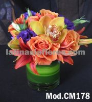 roses, lilies, lisianthus and orchids colorful centerpiece