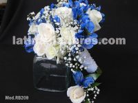 white roses and blue alstroemerias with a touch of baby's breath bouquet