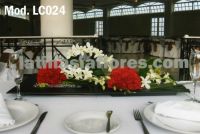 white dendrobium orchids and red carnations pommander Wedding centerpiece