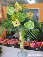 yellow cymbidium orchids and green anthurium wedding centerpiece